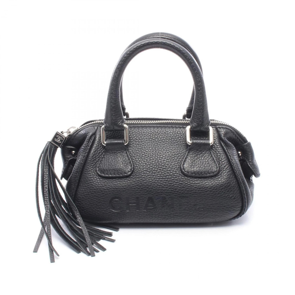Chanel logo handbag, leather, women's, black.